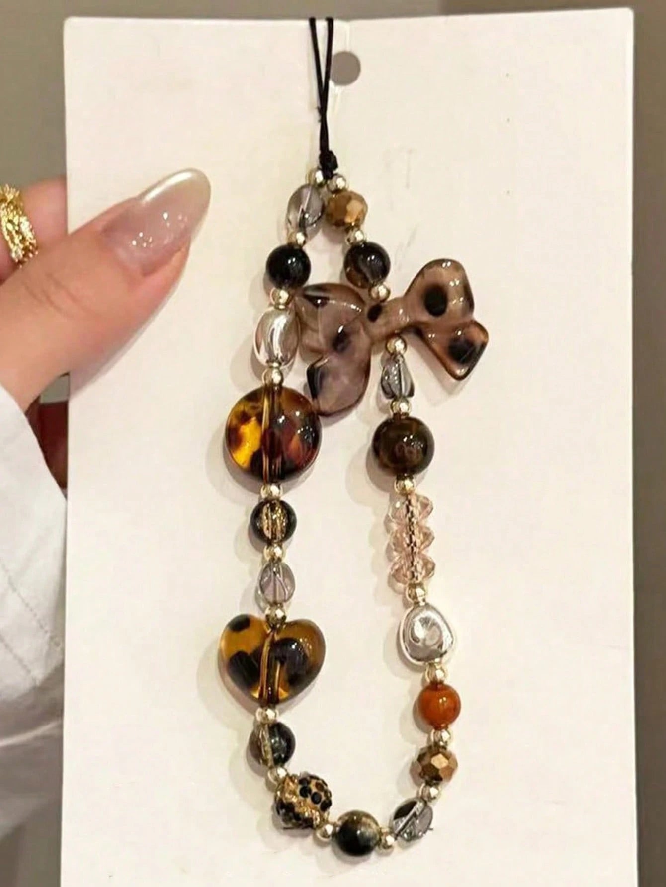 1pc Leopard Print Bow Decor Phone Lanyard, Handmade Beaded Phone Pendant, Phone Strap, CD/Camera Anti-Lost Chain, Bag Charm, Keychain, Compatible With Apple IPod Pro Bluetooth Earphone Case, Autumn/Wi