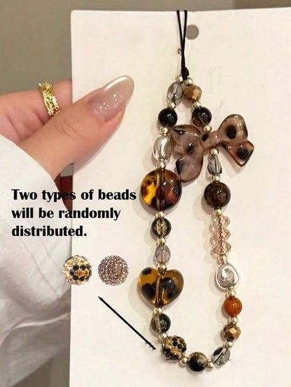 1pc Leopard Print Bow Decor Phone Lanyard, Handmade Beaded Phone Pendant, Phone Strap, CD/Camera Anti-Lost Chain, Bag Charm, Keychain, Compatible With Apple IPod Pro Bluetooth Earphone Case, Autumn/Wi