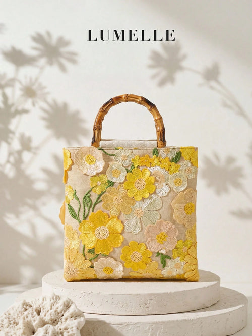 A Summer Style Beige Canvas Tote Bag With Bamboo Handle. This Women's Handbag Combines Linen And Mesh Fabric, Decorated With Exquisite 3D Floral Embroidery, Creating A Bohemian Vibe. It Is The Perfect