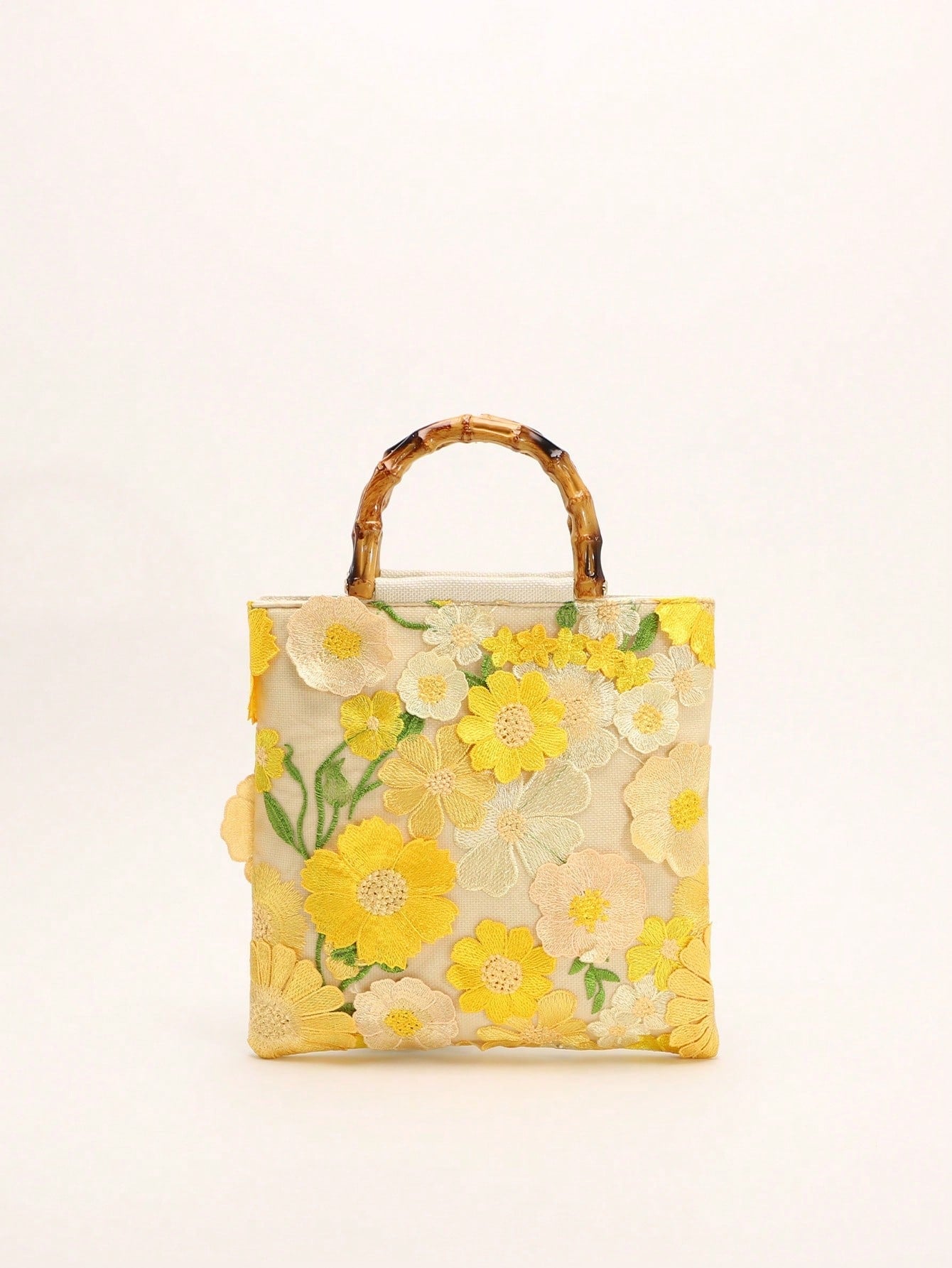 A Summer Style Beige Canvas Tote Bag With Bamboo Handle. This Women's Handbag Combines Linen And Mesh Fabric, Decorated With Exquisite 3D Floral Embroidery, Creating A Bohemian Vibe. It Is The Perfect