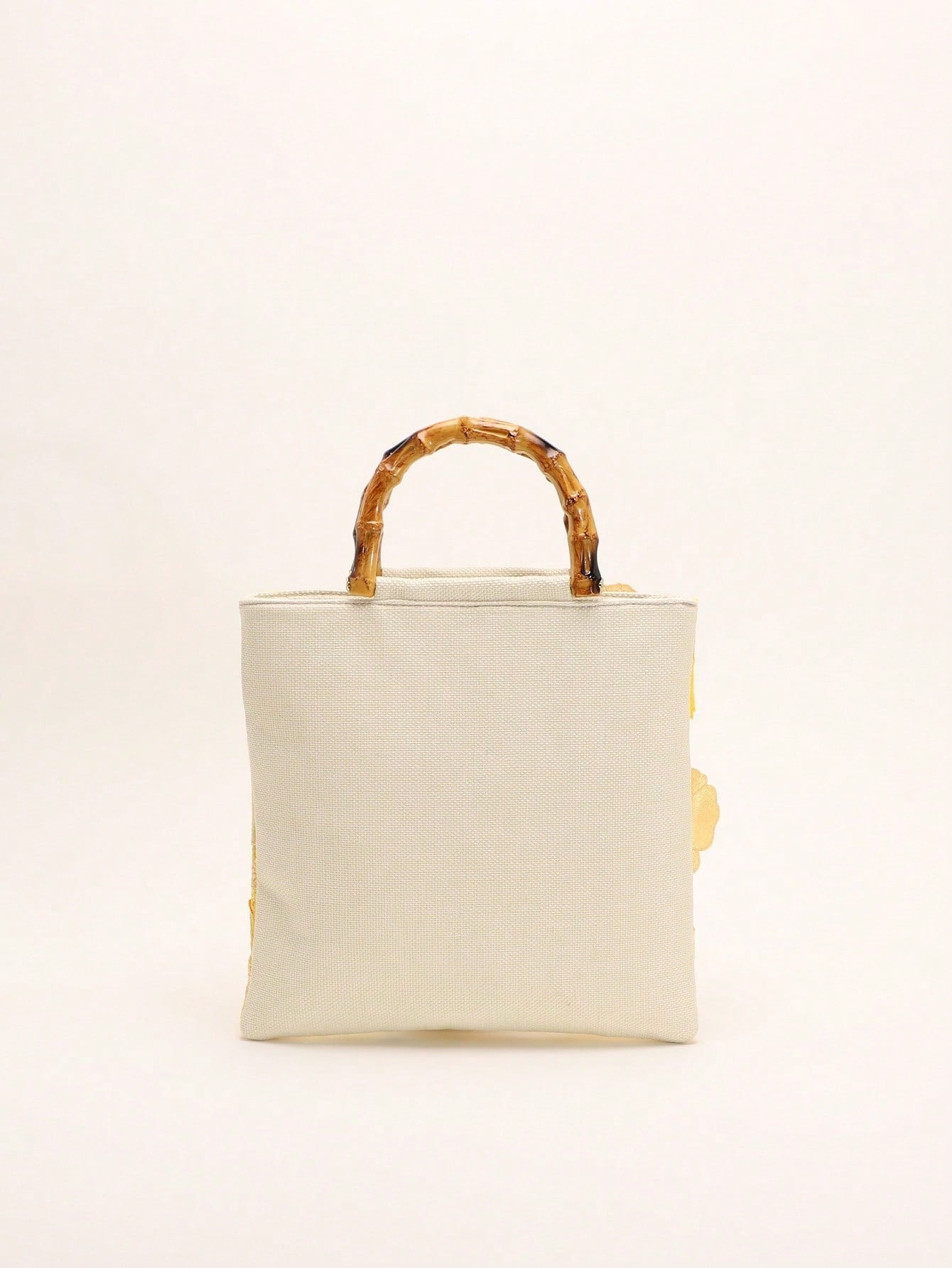 A Summer Style Beige Canvas Tote Bag With Bamboo Handle. This Women's Handbag Combines Linen And Mesh Fabric, Decorated With Exquisite 3D Floral Embroidery, Creating A Bohemian Vibe. It Is The Perfect