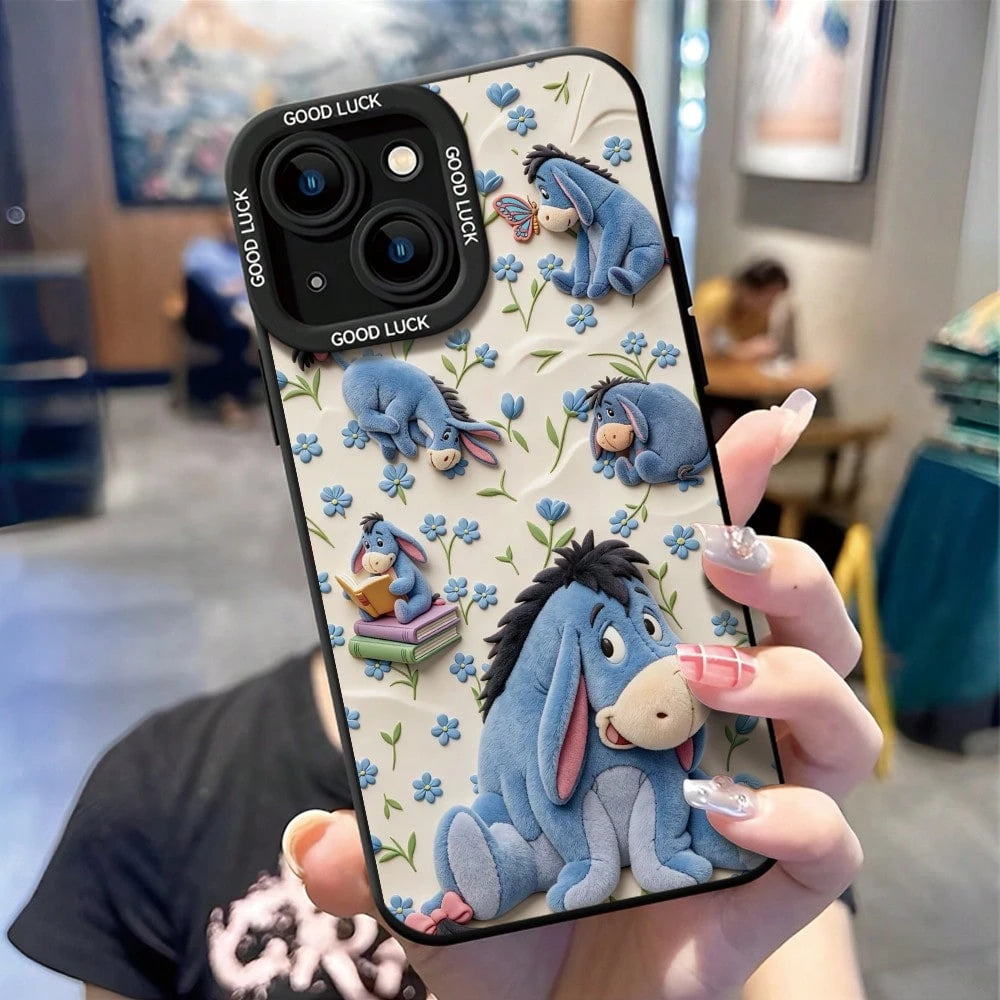 Disney Winnie The Pooh Phone Case, Cute Multi-Pose Eeyore Character Print With Blue Flower, Butterfly & Stacked Book Decor, Off-White Soft Background And "GOOD LUCK" Text On Camera Border, Shockproof