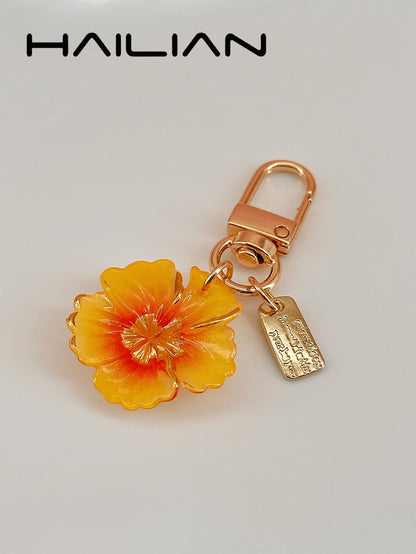 HAILIAN Gradient Floral Resin Pendant, Gold-Edged Alloy Keychain, Ins-Style Aesthetic Charm, Minimalist Fashion Handbag Accessory