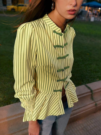 Nöista Striped Blouse With An Elegant Mandarin Collar, A Fitted Peplum Silhouette And Stylish Ruched Cuffs, Offering Refined Feminine