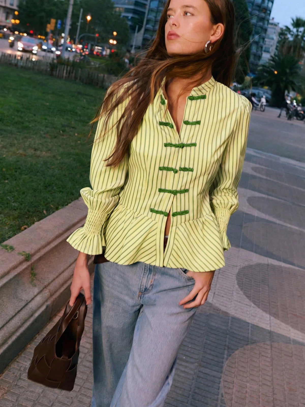 Nöista Striped Blouse With An Elegant Mandarin Collar, A Fitted Peplum Silhouette And Stylish Ruched Cuffs, Offering Refined Feminine