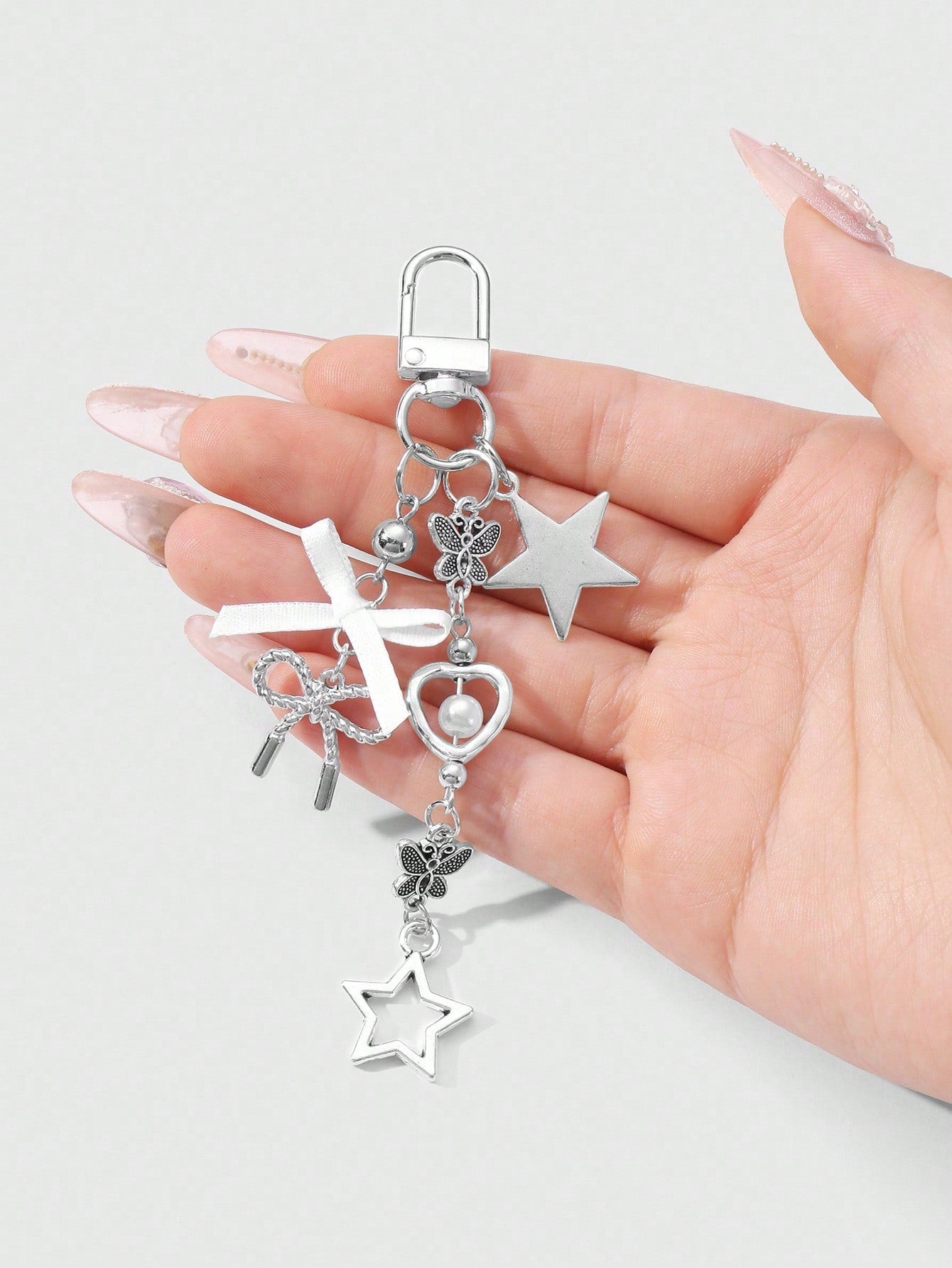 ROMWE Kawaii 1pc Y2K Minimalist High-End Silver Butterfly Faux Pearl Hollow Heart Star Woven Bow DIY Keychain Bag Charm, Suitable For Women/Girls Daily Wear, Holiday Gift