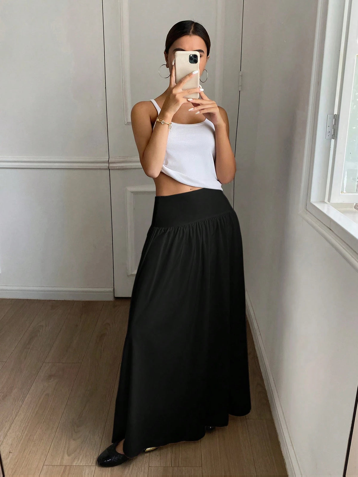Serisse Women's Solid Color Black Pleated Simple Casual Mid-Length Skirt Winter Spring