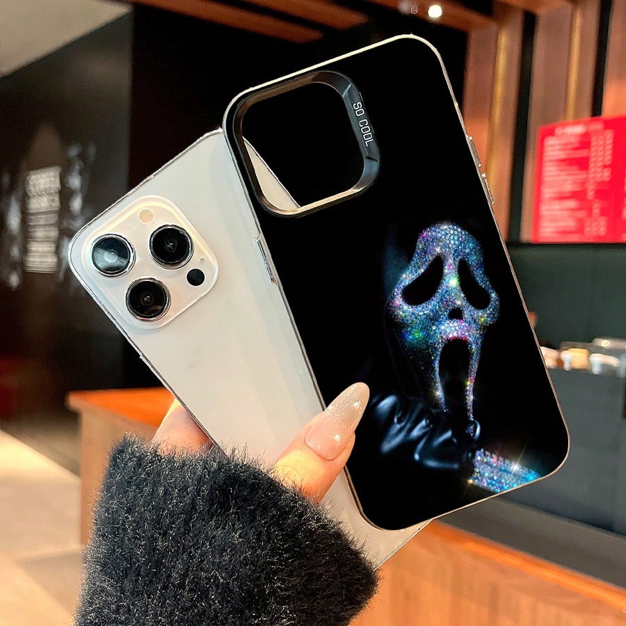Sparkling Ghost Face Mobile Phone Case Designed With Rhinestones And A Sleek Black Finish Suitable For IPhone 16 15 14 13 12 And 11 Pro Models Made Of TPU Material And Provides Shockproof Protection.