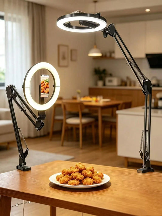 This 10-Inch Ring Light With A Hanging Phone Holder Comes With A Flexible Table Arm. The Ring Light Is Powered By USB, And The Stand Angle Is Adjustable. Suitable For Video Recording, Cooking, Nail Ar