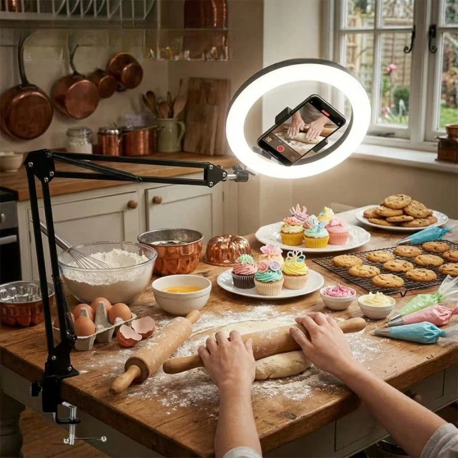 This 10-Inch Ring Light With A Hanging Phone Holder Comes With A Flexible Table Arm. The Ring Light Is Powered By USB, And The Stand Angle Is Adjustable. Suitable For Video Recording, Cooking, Nail Ar
