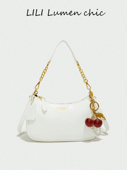 This Fashionable Shoulder Bag Features A Classic Letter Pattern And Pearl Cherry Pendant Decoration. Made Of Solid-Color Waterproof PU Material, It Can Be Used As A Shoulder Bag, Underarm Bag, Crescen