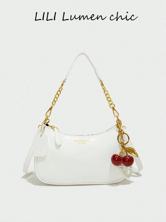 This Fashionable Shoulder Bag Features A Classic Letter Pattern And Pearl Cherry Pendant Decoration. Made Of Solid-Color Waterproof PU Material, It Can Be Used As A Shoulder Bag, Underarm Bag, Crescen