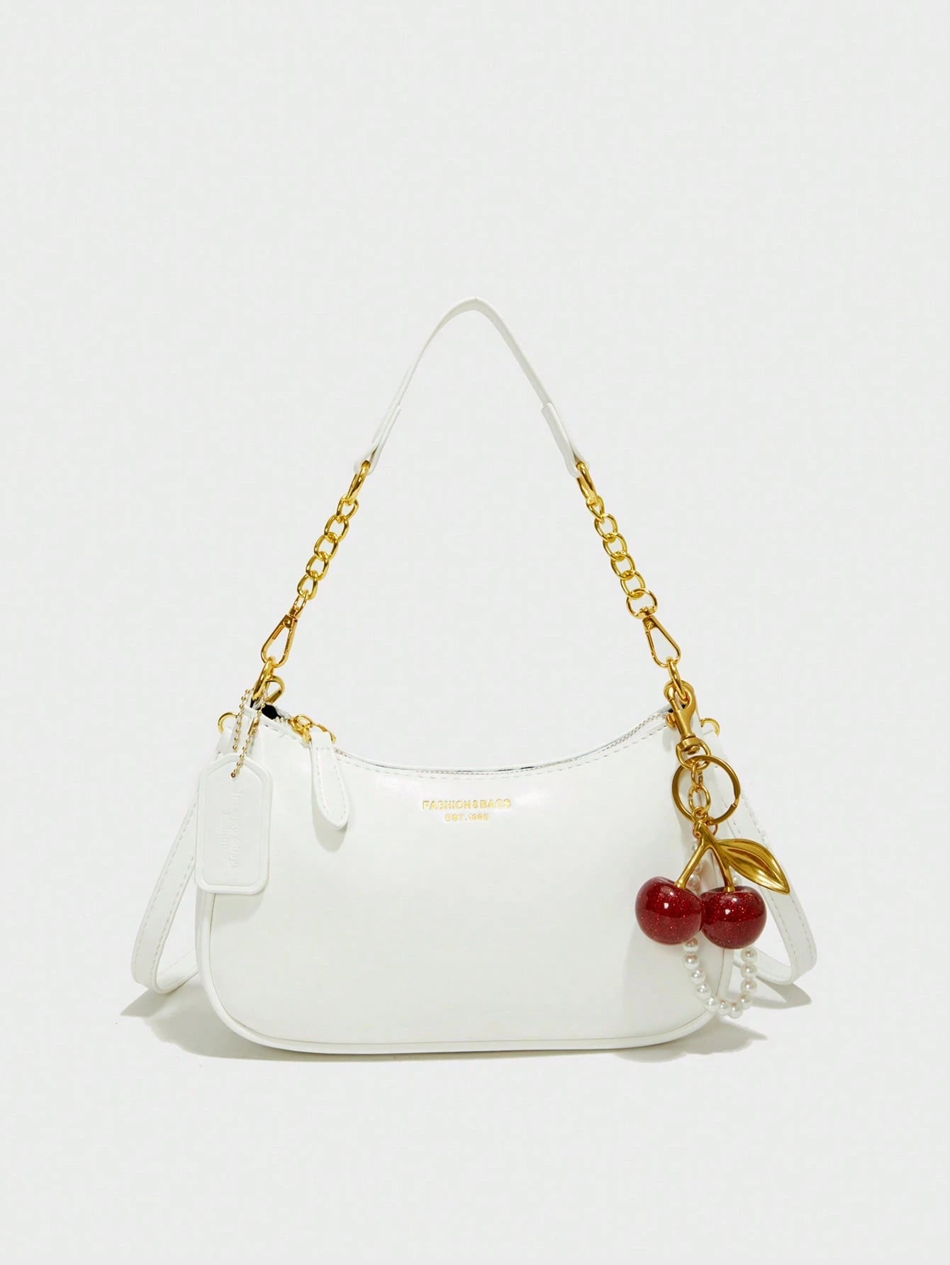 This Fashionable Shoulder Bag Features A Classic Letter Pattern And Pearl Cherry Pendant Decoration. Made Of Solid-Color Waterproof PU Material, It Can Be Used As A Shoulder Bag, Underarm Bag, Crescen