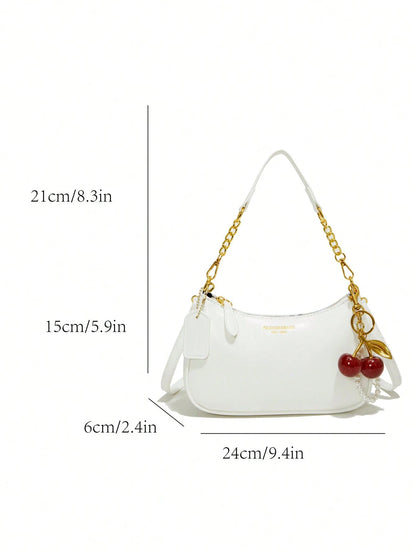 This Fashionable Shoulder Bag Features A Classic Letter Pattern And Pearl Cherry Pendant Decoration. Made Of Solid-Color Waterproof PU Material, It Can Be Used As A Shoulder Bag, Underarm Bag, Crescen